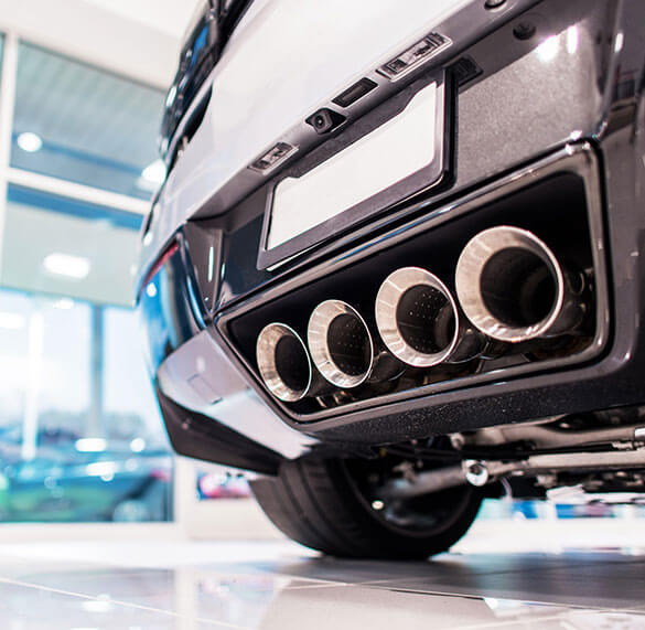 Back in on the back of a car zoomed in on the exhaust